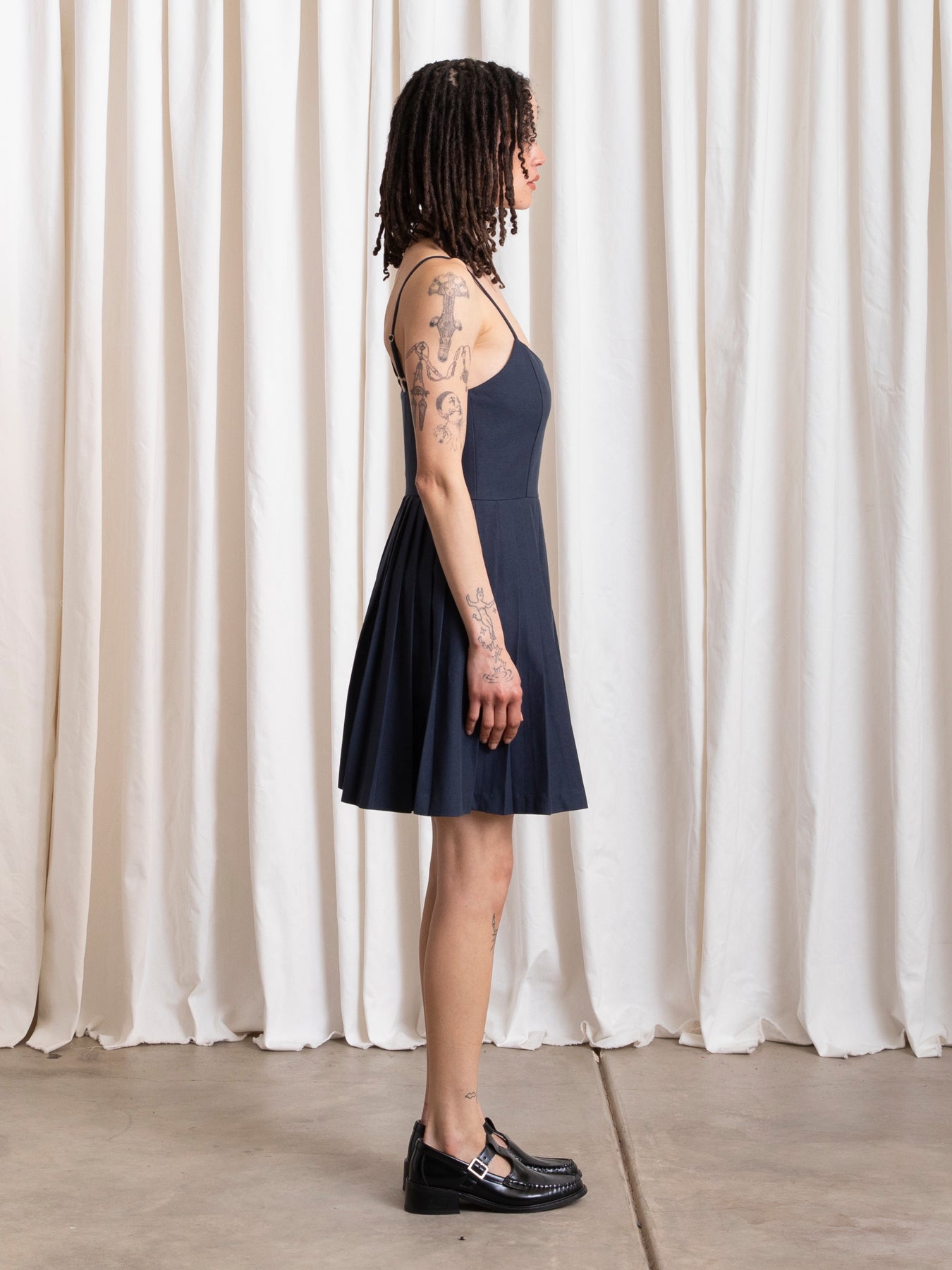 PLEATED MINI DRESS - DEEP NAVY