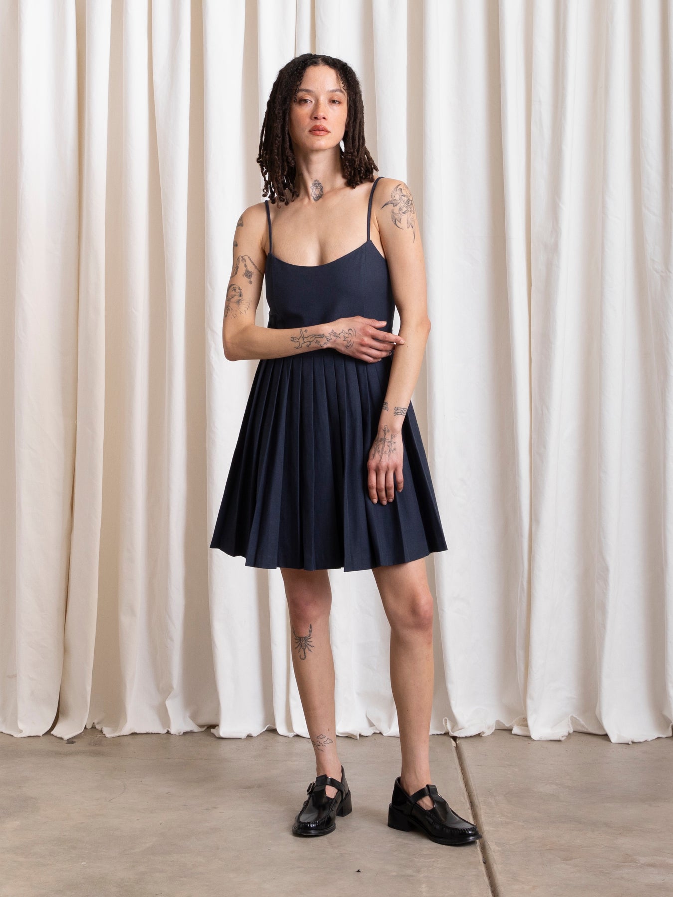 PLEATED MINI DRESS - DEEP NAVY