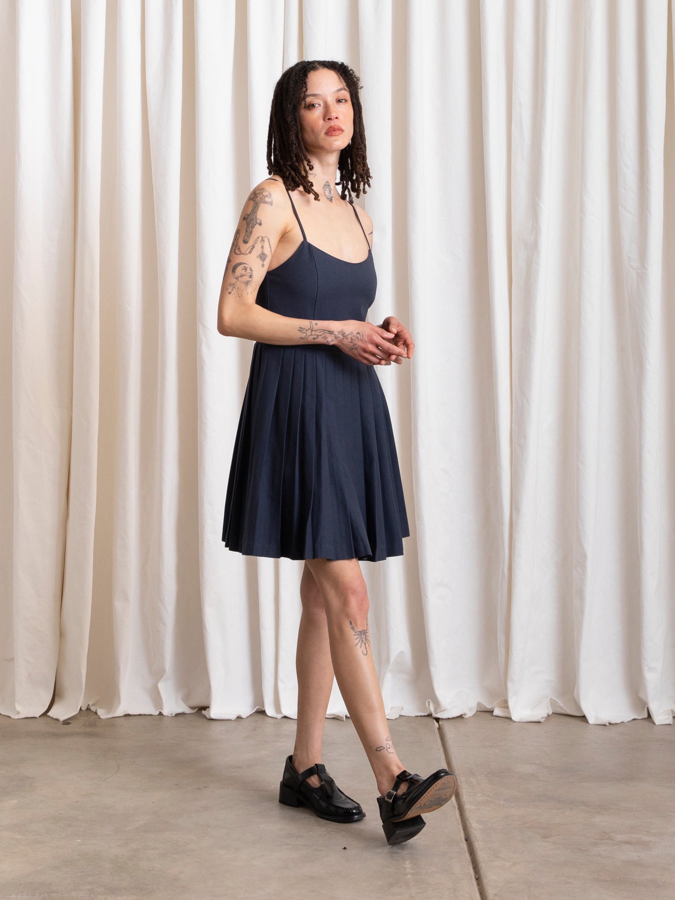 PLEATED MINI DRESS - DEEP NAVY