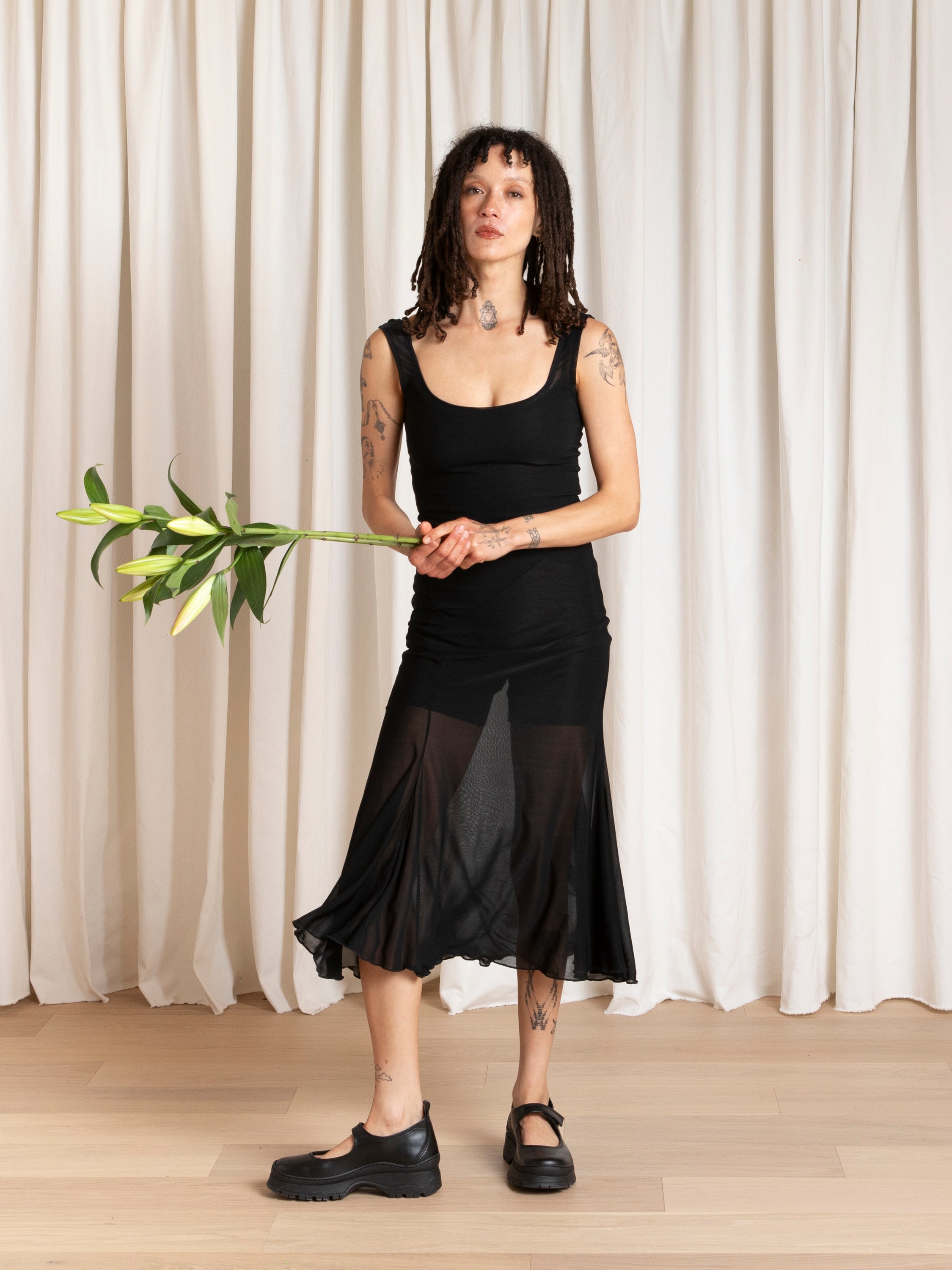 TANK DRESS W/ ASYMMETRICAL HEM - BLACK