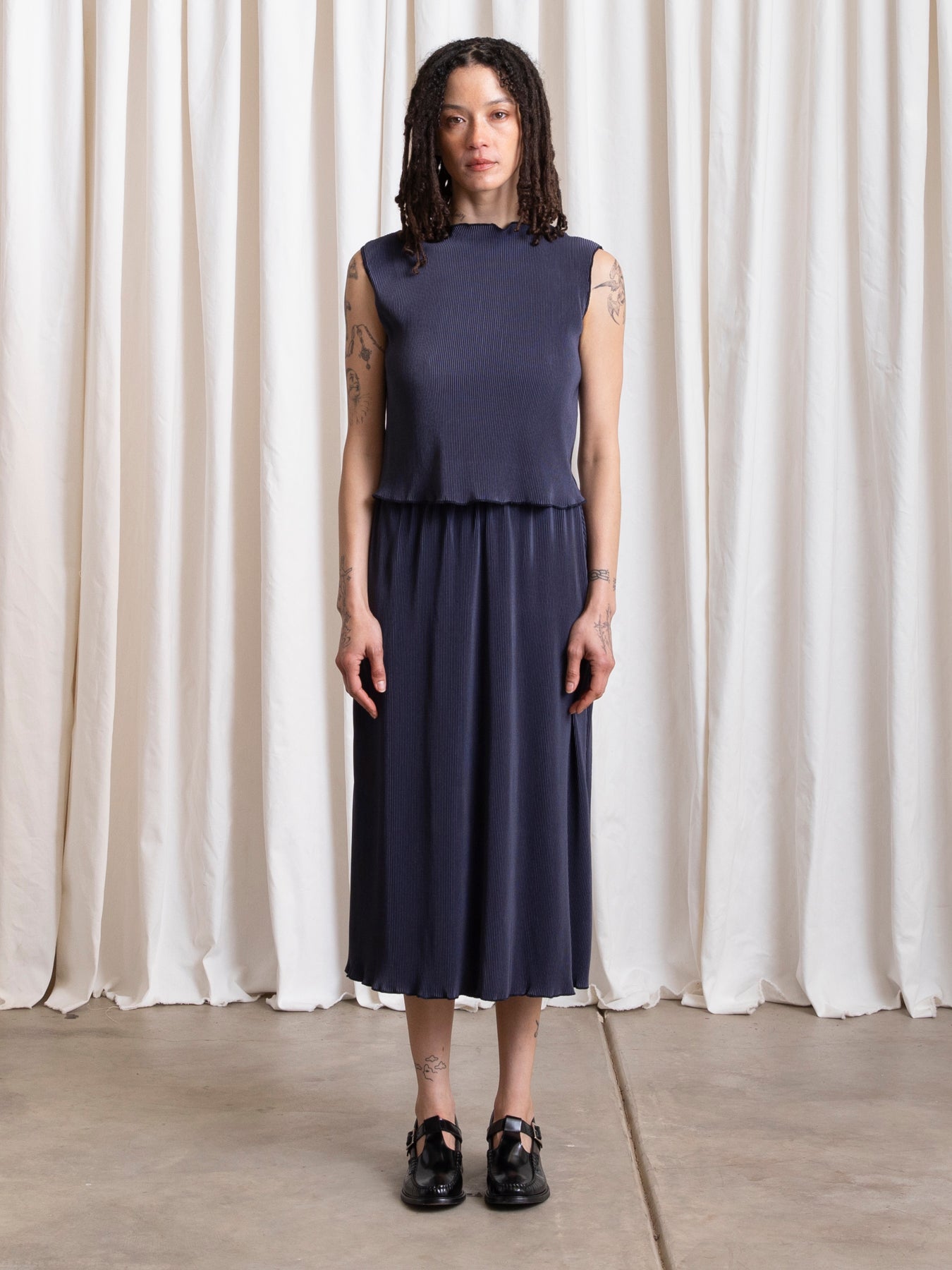 SPRING PLEATED SLIM MIDI SKIRT - NAVY