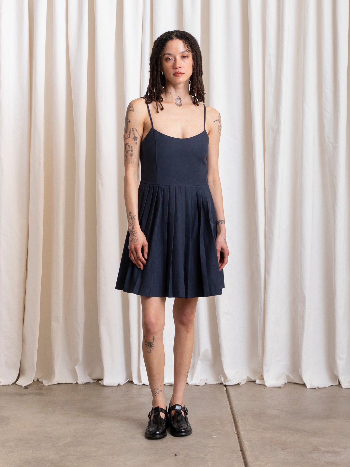 PLEATED MINI DRESS - DEEP NAVY