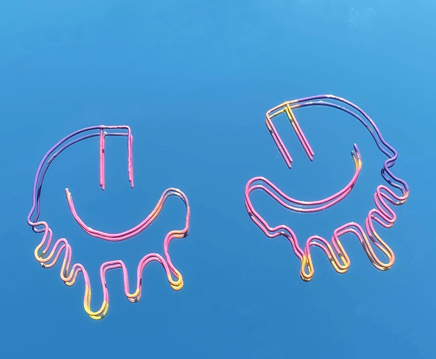 ACID MELT SMILE EARRINGS - BLACK
