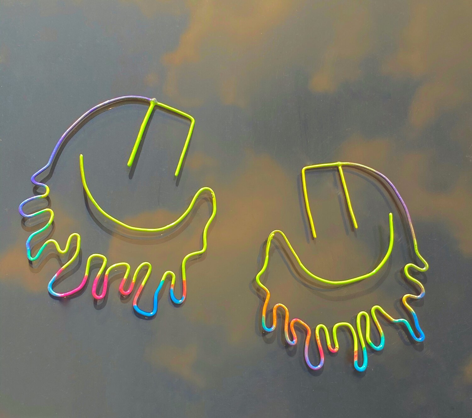 ACID MELT SMILE EARRINGS - BLACK