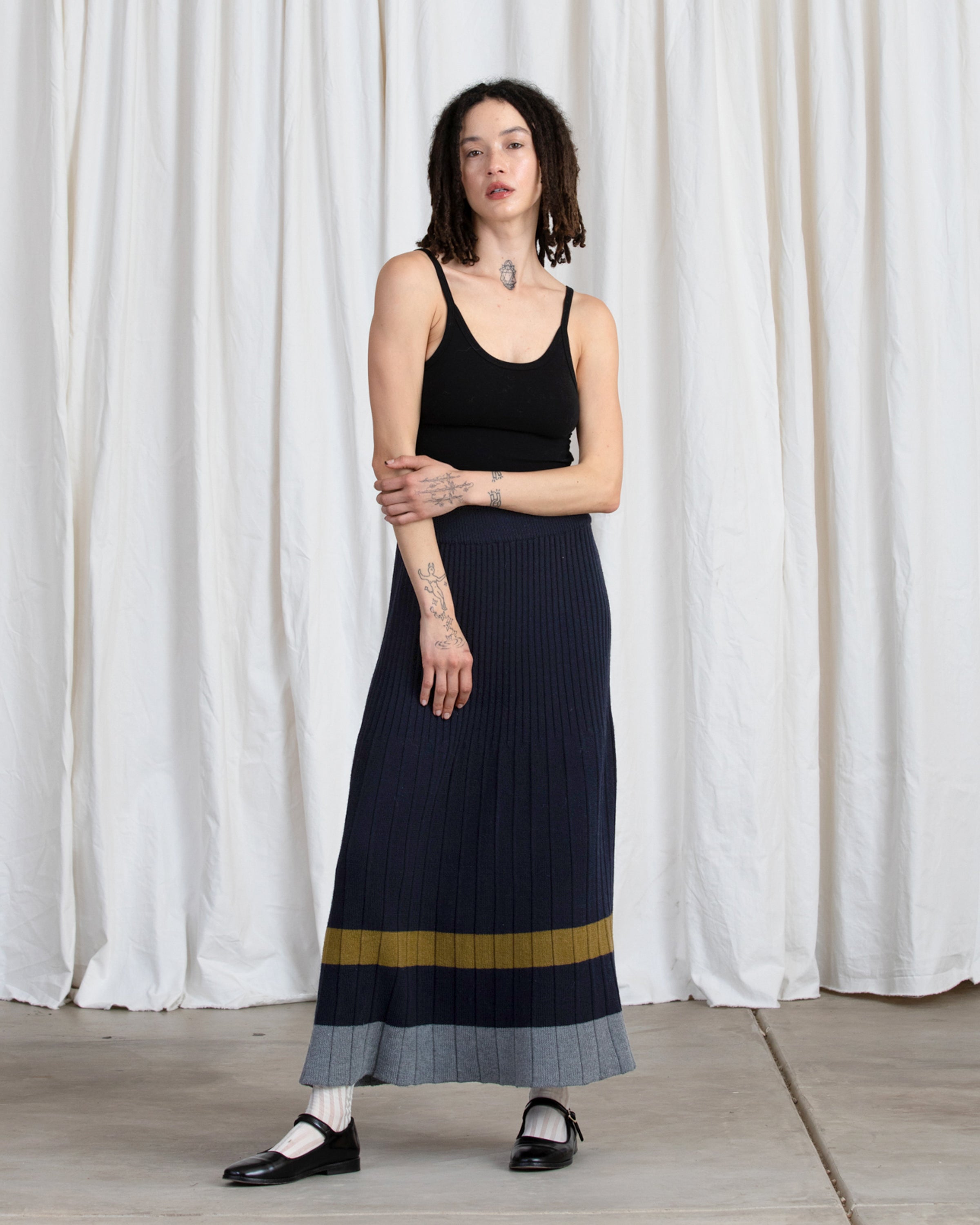 PLEATED KNIT SKIRT - NAVY